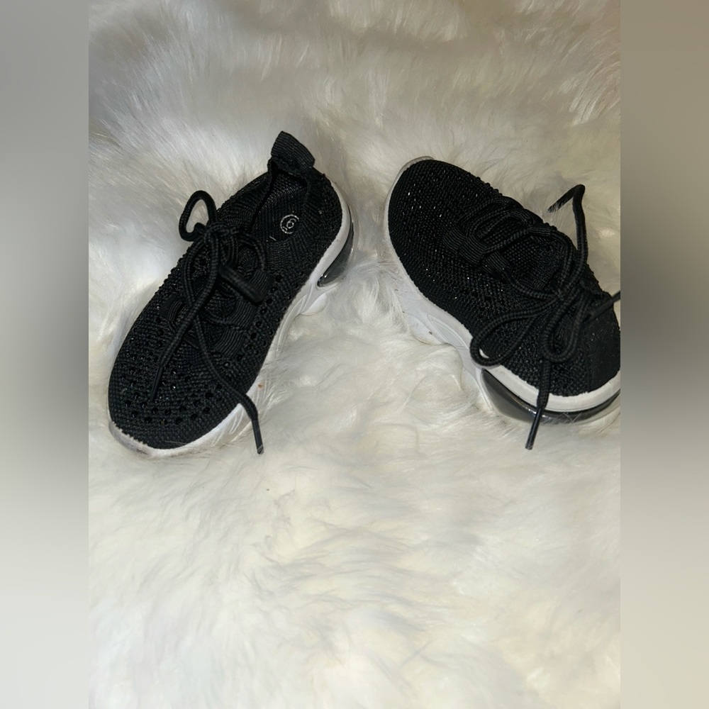 Little girl rhinestone shoes. they are stretchy and lace up. Size 6 toddler.